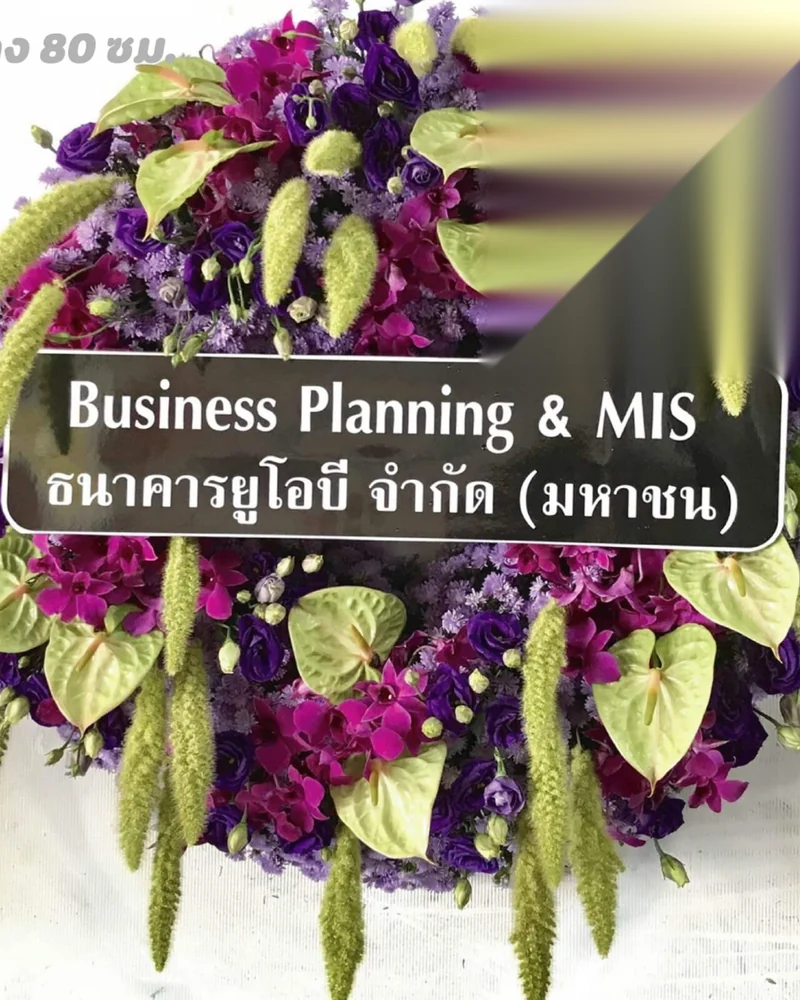ดอกไม้สดโทนขาวที่ใช้ในพิธีช่วงเก็บอัฐิ